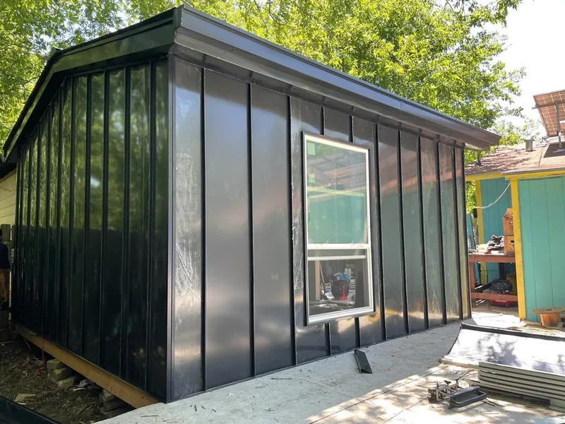 Black standing seam metal wall panels for Roof Inspection in Mount Healthy