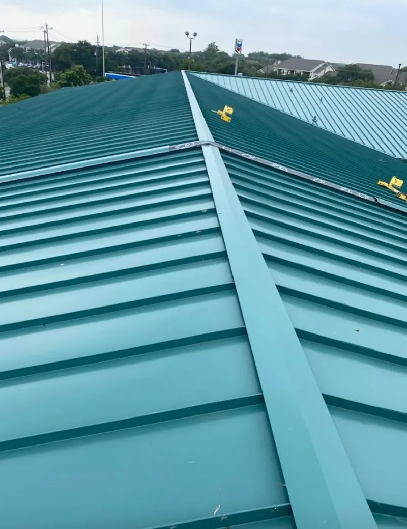 Green commercial metal roof ridge and valley for Metal Roof Repair in Mount Healthy
